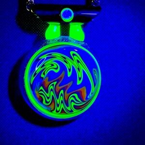 Handcrafted wigwag pendant.